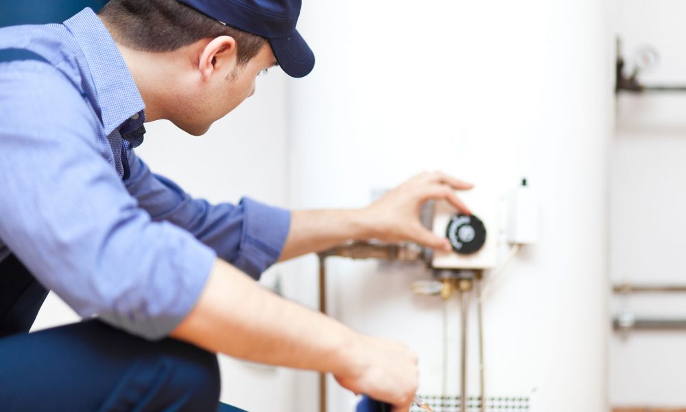 Do You Need a Plumber Or Electrician for Hot Water Repairs?